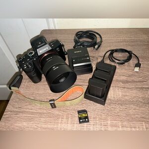 Sony A7RIII with Sony FE 50mm f/1.8 lens. With extra accessories.